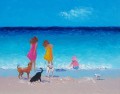 Mädchen und Hunde am Strand